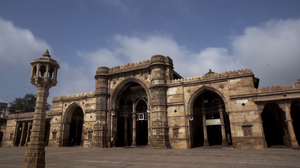 A historic stone mosque facade in Ahmedabad