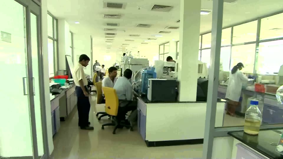 Researchers at work in a modern Indian laboratory