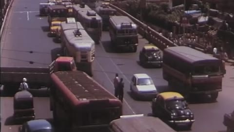 Still from Yellow taxis and buses at a crossing